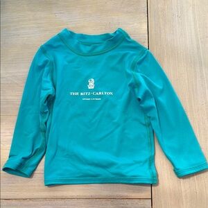 The Ritz-Carlton Teal Long Sleeve Swim Shirt